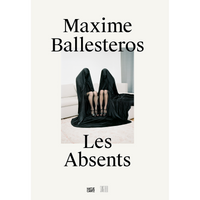 The book cover for Les Absents by Maxime Ballesteros. The cover features a photograph of two figures sitting on a white sofa, completely shrouded from head to toe in flowing black fabric. Only their lower legs are visible, showing stockings and black high-heeled sandals.