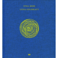 The royal blue, cloth-bound cover of the book Still Here by Lydia Goldblatt. Centered on the cover is a large, hand-drawn circular scribble in bright yellow. The title and author's name are printed above the graphic in a matching yellow serif font.