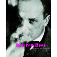 A black and white book cover featuring a close-up photograph of the artist Paul Klee. He looks intently at the camera while smoking, with a plume of smoke in the foreground. The title, Meister Klee!, is overlaid in bright pink, with the subtitle, Lehrer am Bauhaus, in white below.