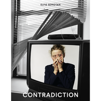 A book cover for Elfie Semotan's Contradiction. A photograph shows an old television in a black and white room with severely bent window blinds. On the TV screen is a vivid color image of a blonde woman wearing large rings, covering her face with her hands in a pose of distress or exhaustion.