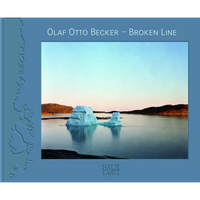 The blue book cover for Olaf Otto Becker – Broken Line, published by Hatje Cantz. The cover features a photograph of a large, sculpted iceberg floating in calm water in front of a rocky shoreline. The sky above is a clear gradient of pale blue to a soft pink and orange glow on the horizon at sunrise or sunset. To the left of the image is an embossed, abstract coastline design on the blue cover.
