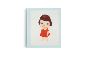 A light blue hardcover book stands upright against a white background. The cover features a Yoshitomo Nara painting of a small girl in a red dress. She has short brown hair and an angry, defiant expression with narrowed, slanted eyes.