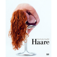 The book cover for Haare by Herlinde Koelbl features a person with a bare, freckled back bent completely forward on a modern metal stool against a white background. Their head is tucked into their knees, and their long, vibrant red, curly hair cascades down towards the floor.
