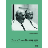 The green cover of the book Years of Friendship, 1944–1956, featuring a black-and-white photograph of two older men, Lyonel Feininger and Mark Tobey, sitting side-by-side. The text below the title reads, The Correspondence of Lyonel Feininger and Mark Tobey.