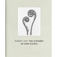 The cover of the book Robert Voit The Alphabet of New Plants. The light-colored, cloth-bound cover features a central black-and-white photograph of two coiled fern fiddleheads unfurling against a plain white background.