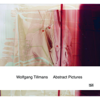 The cover of Wolfgang Tillmans Abstract Pictures, featuring a hazy, distorted photograph of a light-colored jacket with red buttons washed in pink and deep red light.