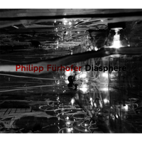 An abstract, black and white photograph of light bulbs reflecting on a dark, textured surface serves as the cover for Philipp Fürhofer Diasphere, with the author's name in red.