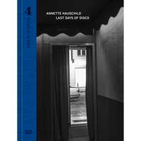 The book cover for Last Days of Disco by Annette Hauschild, featuring a black-and-white photograph of a street viewed from a dark doorway and a prominent blue spine.