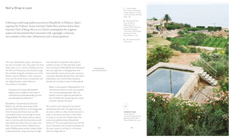 A two-page magazine spread titled Not a Drop Is Lost. The left page contains black text in two columns. The right page features a large photograph of a stone water reservoir on a terraced hillside in a coastal village. The reservoir is surrounded by lush greenery, with houses and the sea visible in the background.