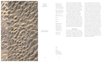 An open book or magazine displays a two-page spread. The left page is a full-page, sepia-toned aerial photograph of the Chale-sonbak earthworks in the Band-e-Rig desert, showing numerous mounds and depressions in the sand. The right page contains the text of an academic article titled On Thirst: Anecdotes on Chasing Hidden Waters, arranged in two columns with footnotes.