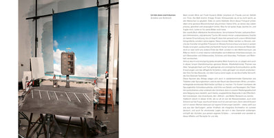 A two-page spread from a book or magazine. The left side features a behind-the-scenes photograph of a miniature model being filmed. The model is an empty parking lot with a tall, concrete sign that reads HOTEL vertically. It is set up in a studio in front of a large blue sky backdrop, with lighting stands and clamps visible. The right side of the spread contains a block of text in German.