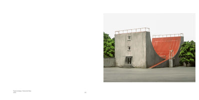 A two-page book spread. The right page shows an architectural photograph of a grey concrete building connected to a large, red half-pipe. The curved surface of the half-pipe is marked with the white lines of a tennis court, and a tall umpire's chair sits at its base. The left page is mostly white with small text at the bottom.