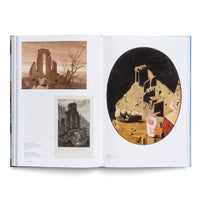 An open art book with a two-page spread comparing different artistic interpretations of ruins. The left page displays two 19th-century etchings of gothic ruins in desolate landscapes. The right page features a large, oval-shaped surrealist painting by Max Ernst, depicting abstract, block-like ruins on a hill against a black background.