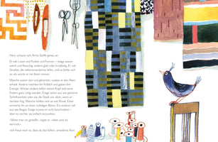 A colorful illustration from a book spread with German text on the left. The scene depicts a sewing or craft room, with various patterned fabric swatches hanging on the wall. A small, stylized blue bird with a crest perches on the back of a wooden chair. Illustrations of scissors and spools of thread complete the composition.