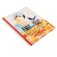 A hardcover book titled Anni und Hans lies at a diagonal angle on a white background. The cover features a colorful illustration of a person in a patterned head covering looking at a small blue bird made of thread that is perched on their finger. The background is composed of warm tones and orange vertical lines.