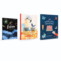 Three colorfully illustrated books stand upright against a white background. The book on the left has a dark cover with a space theme titled Leben. The middle book, Anni und Hans, features a portrait of a person holding a bird. The book on the right, Das Grand Hotel der Gefühle, has a dark blue cover with whimsical illustrations of a red hotel and other motifs.