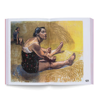 An open art book displaying a colorful illustration on page 121. The drawing features a woman sitting on the floor with her legs stretched out, viewed from a three-quarter back angle. She looks over her shoulder, her fists clenched. Her white bra strap is visible above a dark patterned skirt. Another woman sits in the background against a yellow, sketch-like wall.