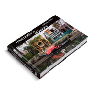 A hardcover book titled Imaginations of Venice by Stefanie Bürkle, lying at an angle on a white surface. The cover features a photograph of a gondola with a red covering floating in a canal next to modern houses and lush green foliage.