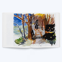 An open book on a white background displays a two-page spread of an expressive, abstract painting. The artwork depicts a landscape with bare brown trees next to a body of water and a blue sky, with a path on the right partially covered by large, amorphous black shapes and scribbles.