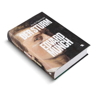 A studio photograph of a hardcover book titled Der Sturm by Ivo de Figueiredo, a German-language biography of Edvard Munch. The book is angled on a white surface, showing the front cover and spine. The cover art is a painted portrait of a young man with the title in a large, bold, white font.